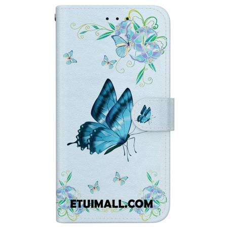 Etui Folio Do iPhone 16 Niebieski Motyl I Kwiaty Z Paskiem